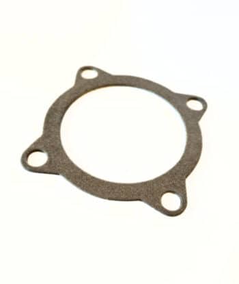 Eine Dichtung für übergang Flansch - eine flache, kreisförmige Dichtung mit vier gleichmäßig verteilten Schraubenlöchern - vor einem schlichten weißen Hintergrund.