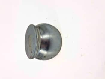 Die Endkugel S9, ein kleiner runder Metallbehälter mit flachem Deckel, ist auf einer weißen Fläche abgebildet.